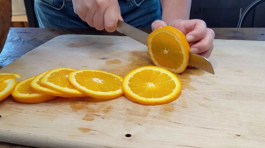 Slice oranges