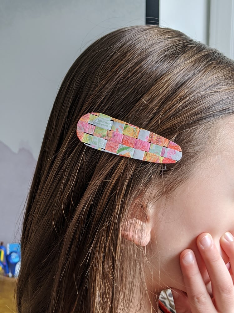 This basketweave barrette is made out of fused plastic fabric