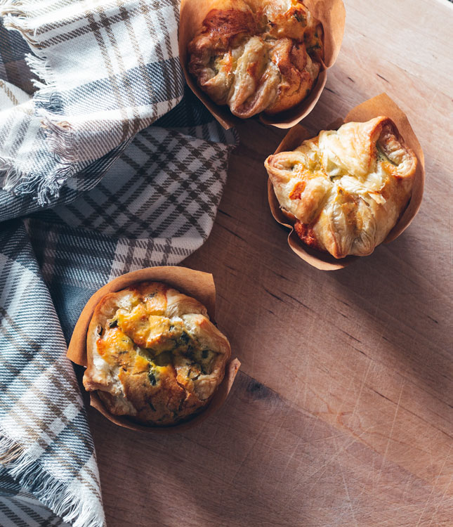 Leftover ham and artichoke dip create these amazing and deceptively easy egg-filled muffins.