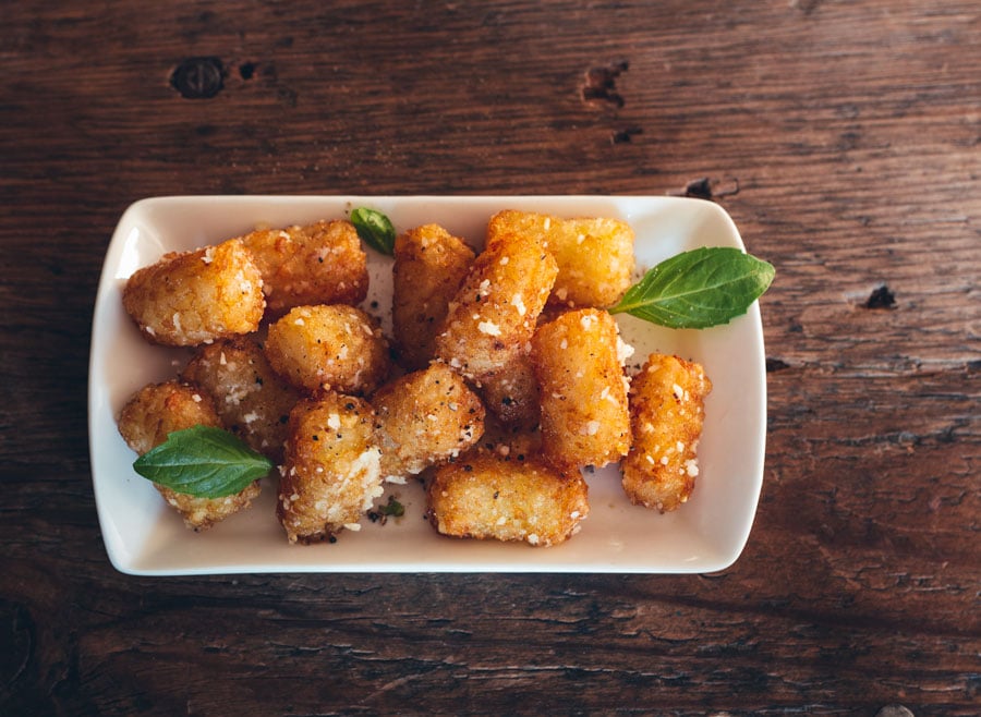 Serve these parmesan truffled tots with a sprinkling of your favorite fresh herbs.