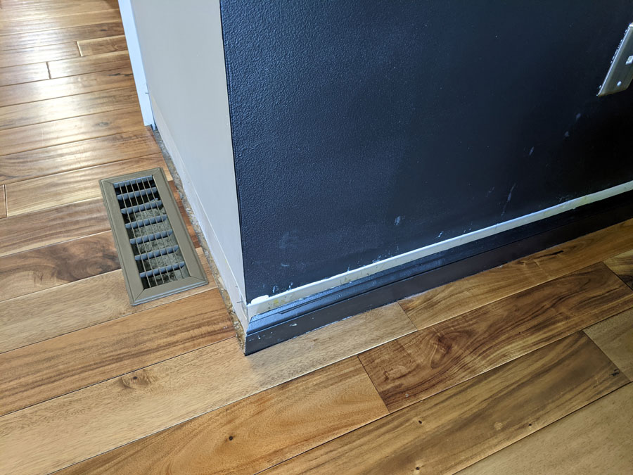 These baseboards are stuck