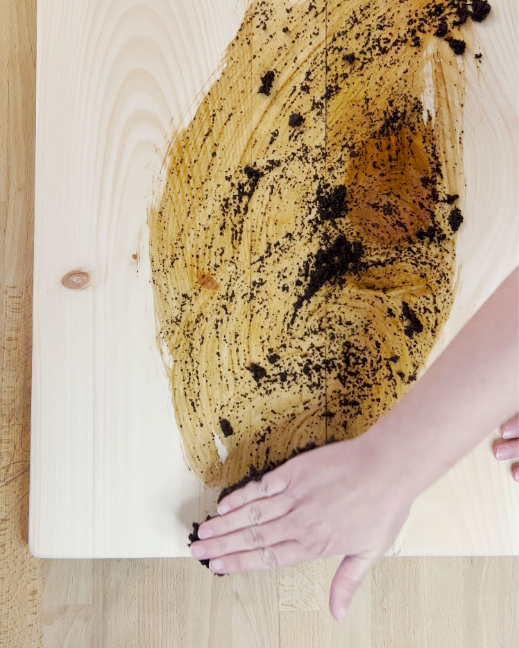 Rub coffe paste into the serving board.