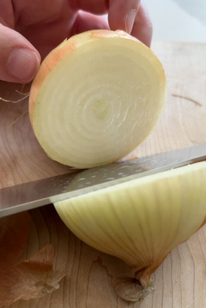 Cutting an onion.