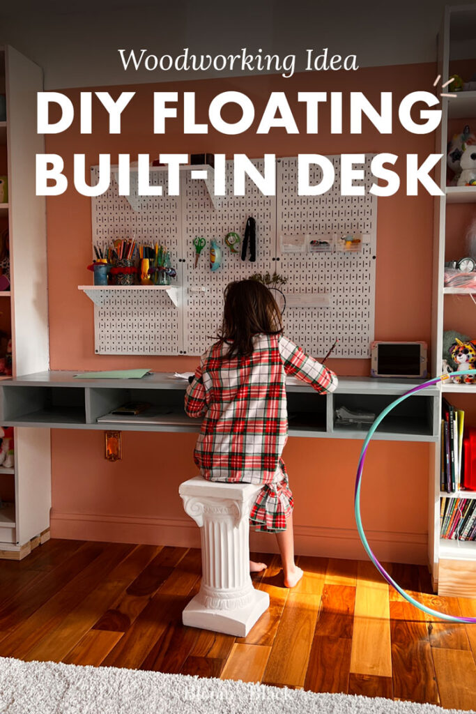 Girl sitting at a desk drawing. The text reads. "Woodworking Idea: DIY Floating Built-In Desk"